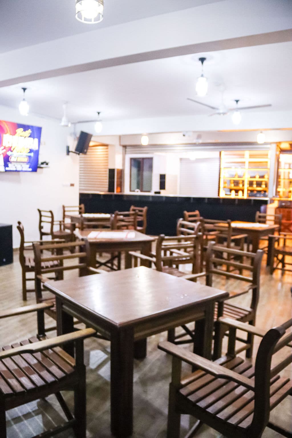 Dining tables arranged inside the restaurant
