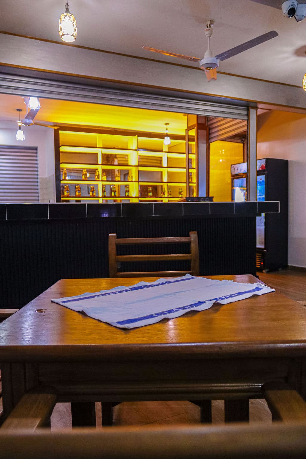 A table set in front of the restaurant bar