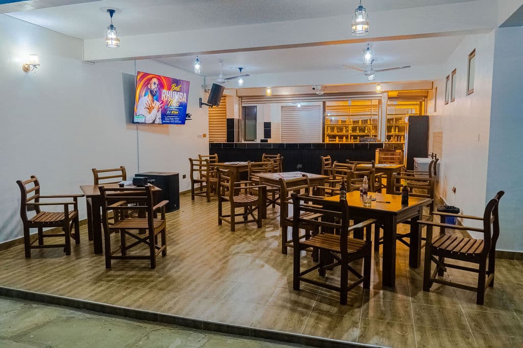 Wide view across HappyLand's dining room and bar